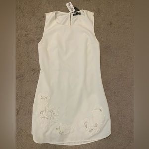White Fabrik mini dress, size small, new with tags.